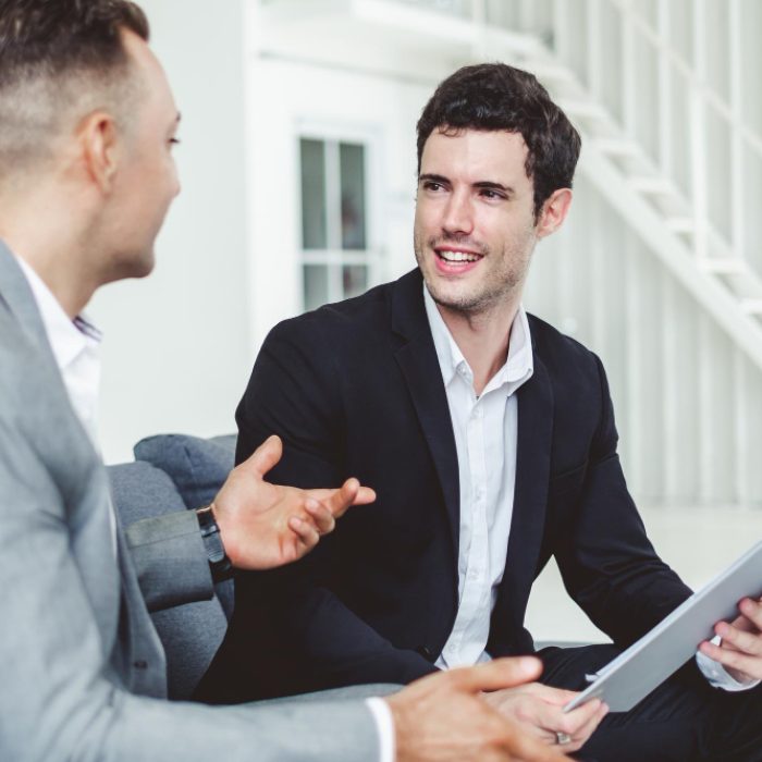 Two people discussing about transaction codes